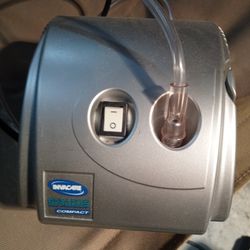 Nebulizer & hose, no mask.  Works Great 