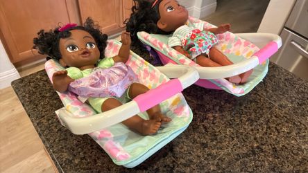 Doll in portable rocking bed