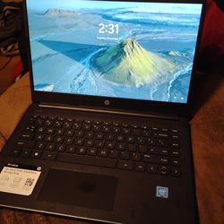 A Brand New HP 14 Inch Laptop Brand New Ain't Never Been Used
