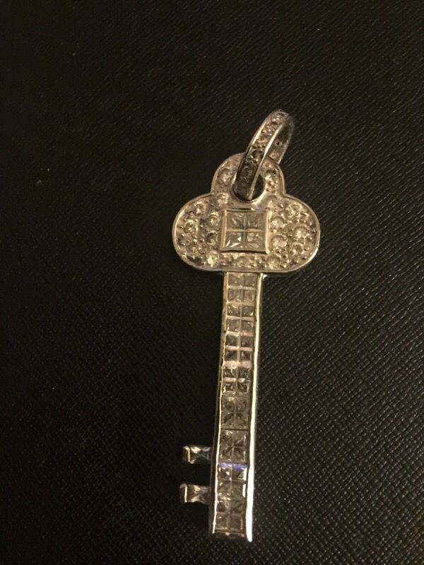 Silver. Key. Charm