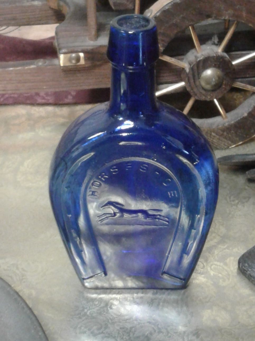 Pewter horse, cowboy hat and horseshoe glass