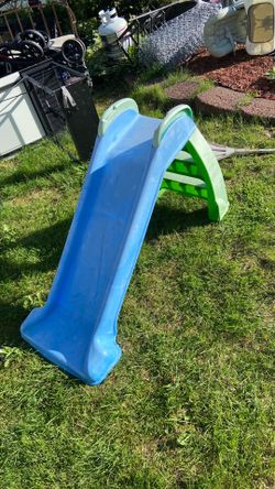 Slide by fisher price. Pick up.  E.  Side.  Tat