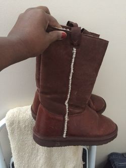 Carmel color brown leather with fur inside and on the side of boots real heavy and durable leather boots size 10