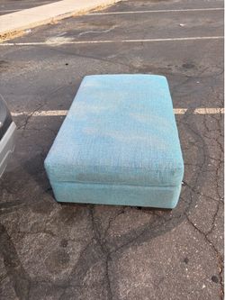 Large blue ottoman foot rest / coffee area