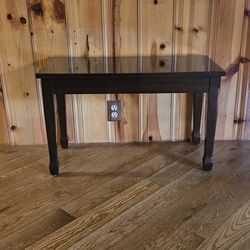 Piano Bench. Walnut finish. 