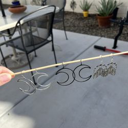 Three Sets Of Earrings