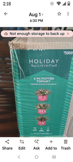Three potted Christmas Decor lights up