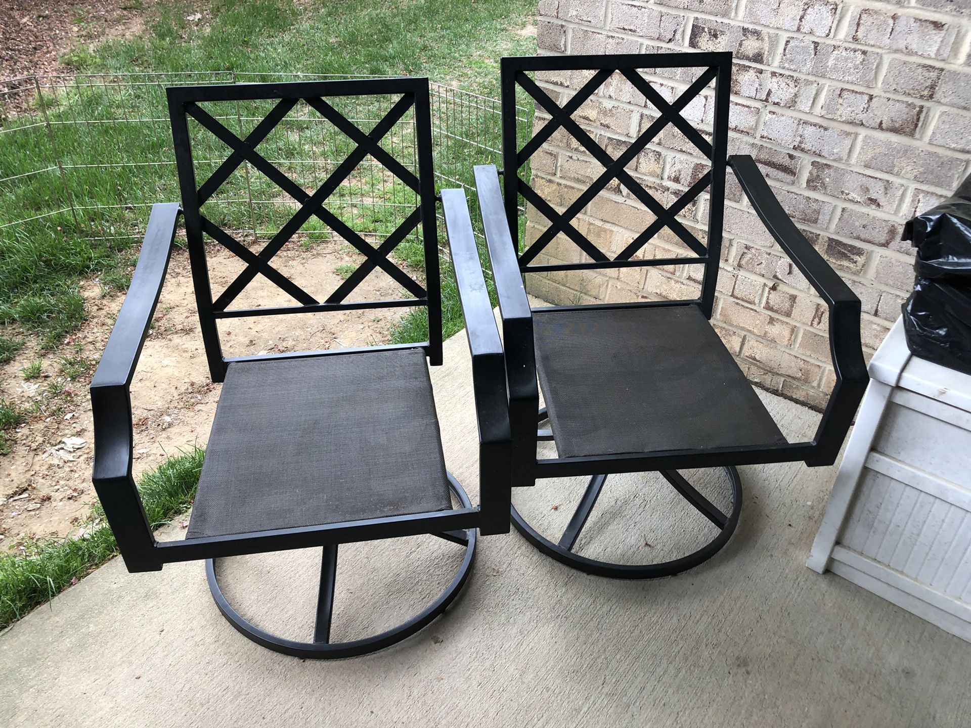 Wrought iron swivel patio chairs