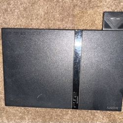 PS2 Slim+2 controllers+memory stick and games (Working + Wires)