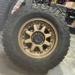 Super-Deal 17” Raceline Bronze Wheels5x127 5x139.7 6x135  & 285-70-17 BF Goodrich Ko2 Tires (We Finance)