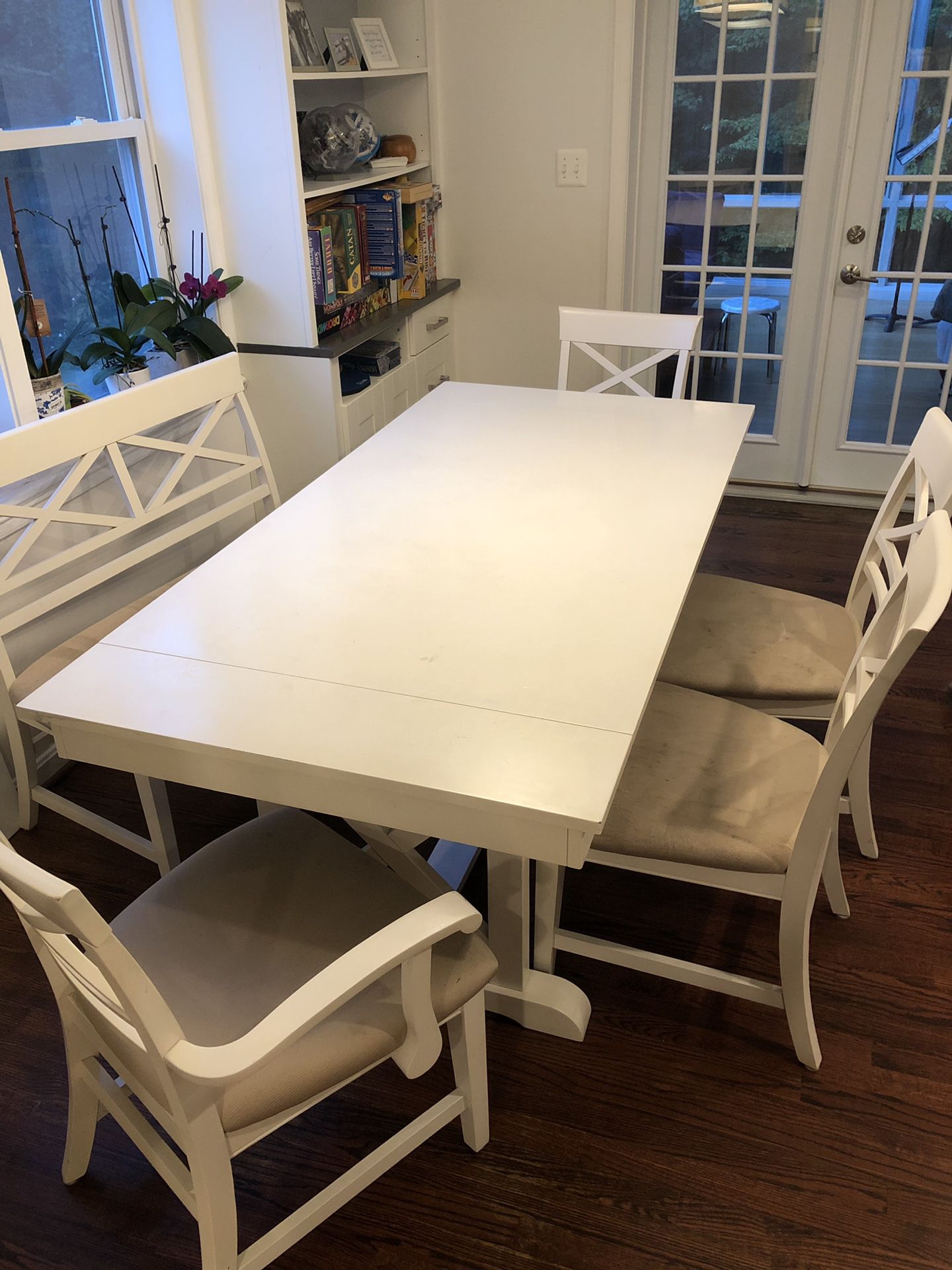 White dining room extendable table and chairs