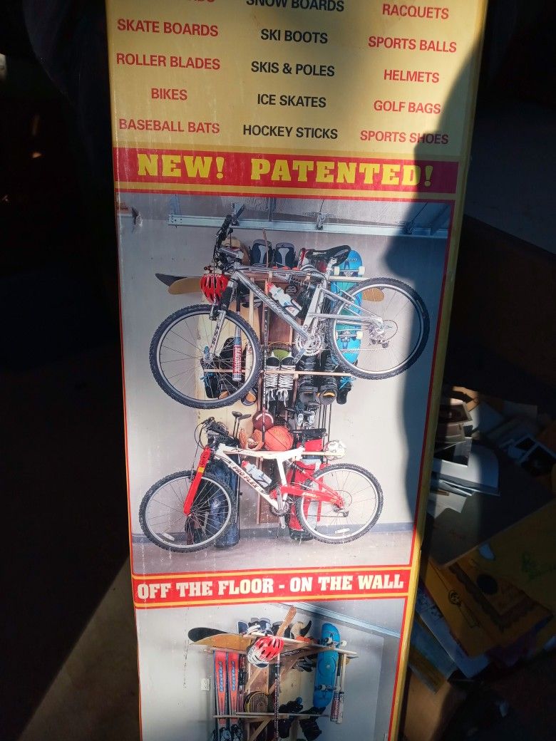 Garage wall mounted bike-sports equipment organizer