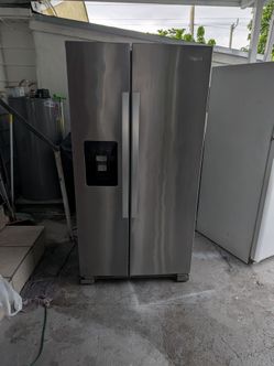 Whirlpool side by side regrigerator