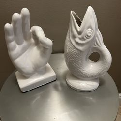 Fish And Hand Statues