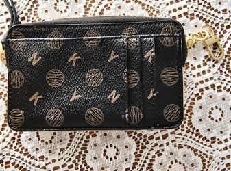 DKNY Pouch With Credit Card Holder On The Outside . Never Used. Not Sure If Authentic But Still A Good Price For Easter Gift