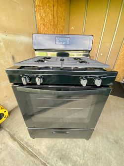 Whirlpool gas stove 4 burners black color  30”