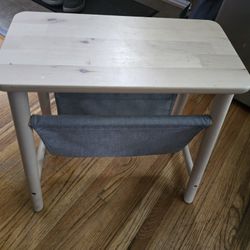 Wooden stool with holder underneath