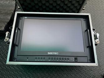 SEETEC ATEM156-CO 15.6-inch 4K HDMI multiview portable broadcast monitor housed in an aluminum carry case