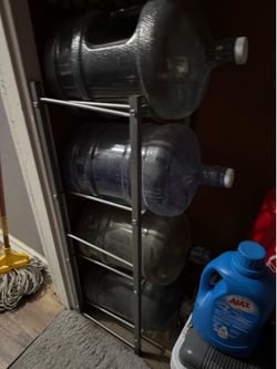 5 gallon water jugs +stand