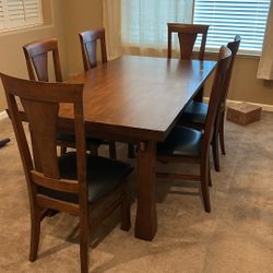 Solid Wood Dining Table and 6 Cushioned Chairs
