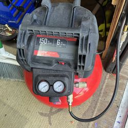 Air compressor great condition and nail gun