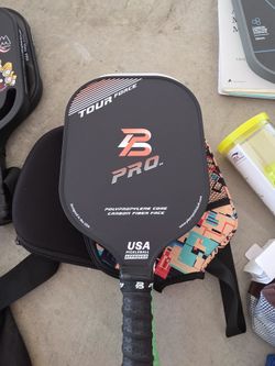 Pickleball paddles and 5 balls