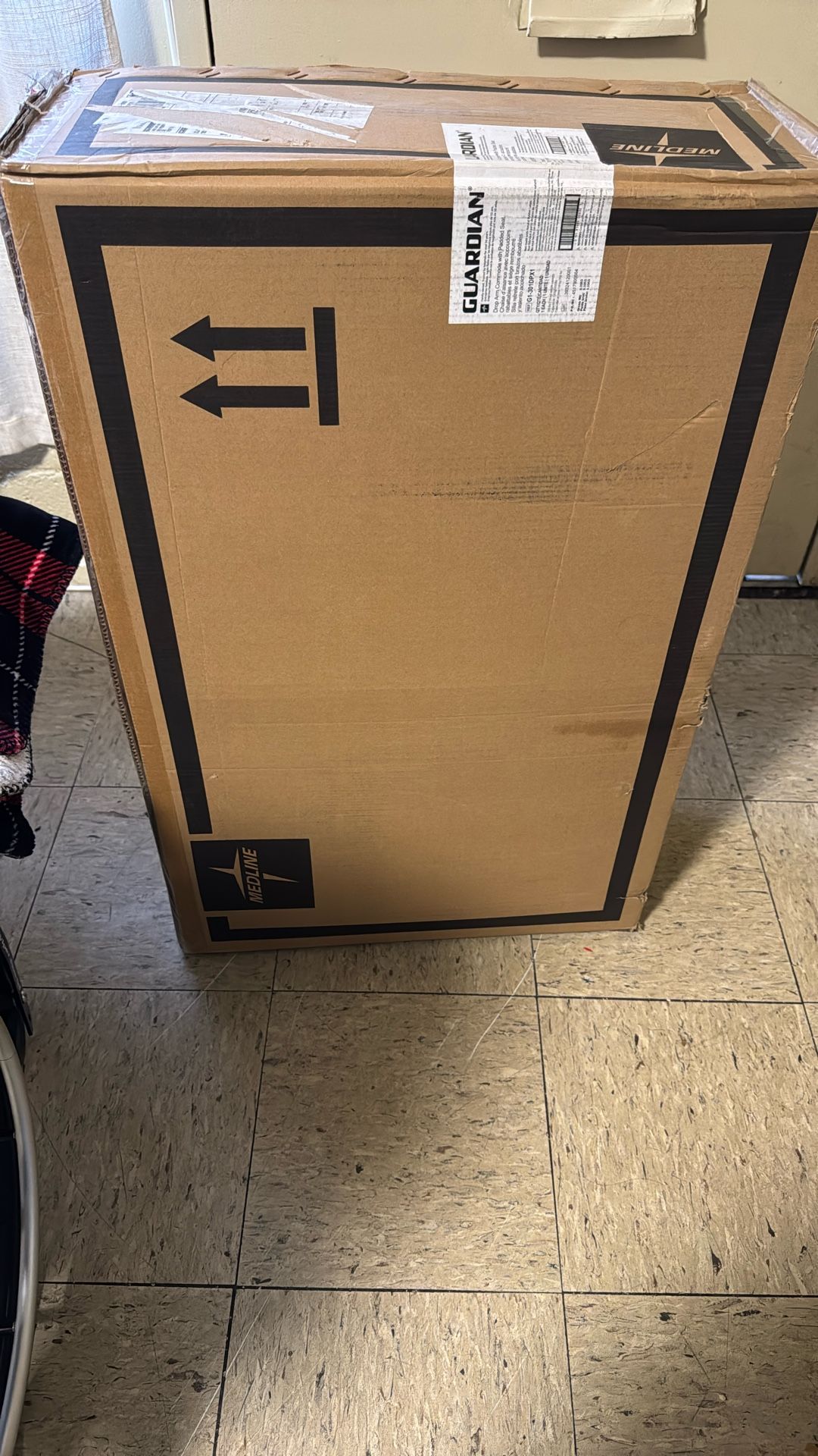 Drop Arm Commode With Padded Seat