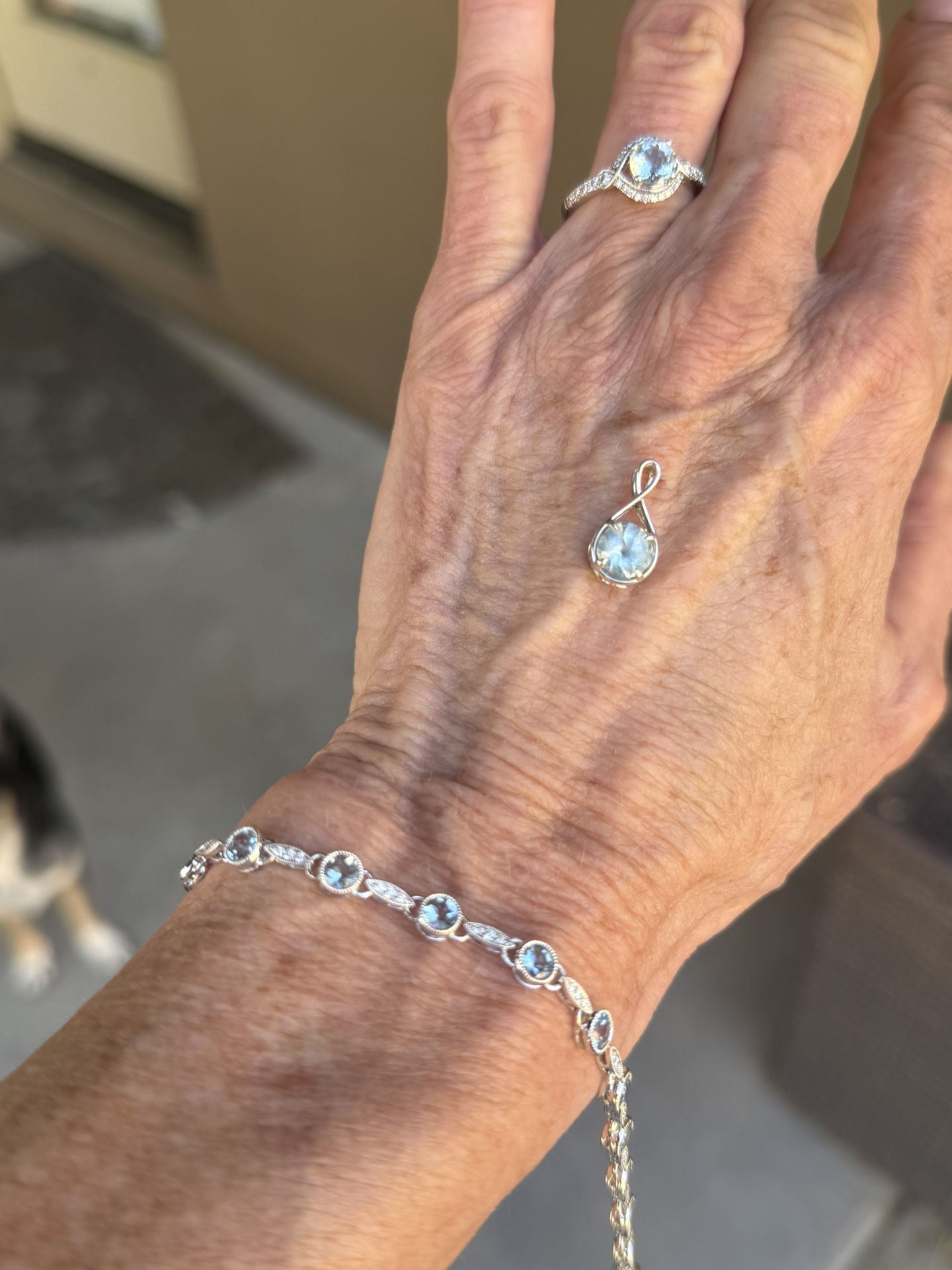 White Gold And Aquamarine Gemstone, Tennis Bracelet, Ring, And Pendant 