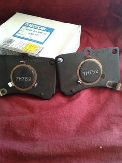 Front brake pads,and rear shoes new for Mazda original brakes in their box $55
