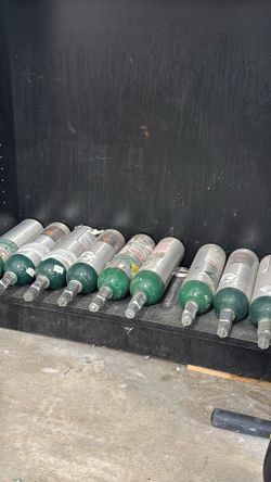Portable medical oxygen cylinders for storing high-pressure gas.