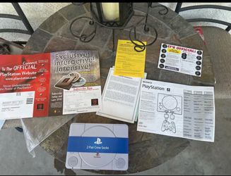 PlayStation manuals and socks