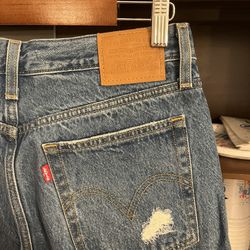 Size 28 - Levi’s Jeans (barely worn)