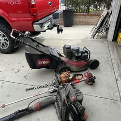 Toro lawn mower, leaf blower, hedge trimmer, and weed wacker