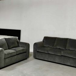 Brand New Couch & Loveseat Set   Modern and comfortable design — perfect for your living room! ✅ Brand new condition ✅ Soft gray upholstery ✅ Includes