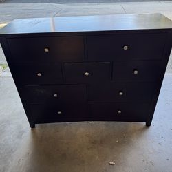 Dark brown dresser  52” w x 18” d x 40” tall