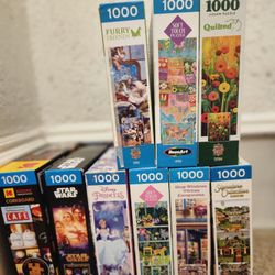 Various 1000 piece puzzles ($5 each) with completed picture 