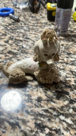 Vintage Sitting Off White Spaghetti Poodle Dog Figurine