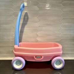 Vintage little tykes sparkly pink doll wagon with blue handle It’s a perfect size for stuffy’s and dolls and any little toys your child wants to pull 