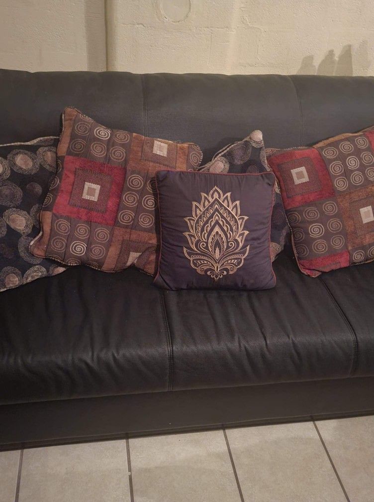 black faux leather sofa