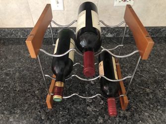 The sharper image 9-bottle wine rack.