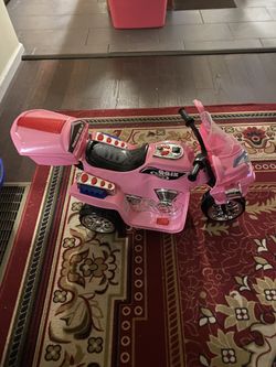 battery operated motorcycle with storage 