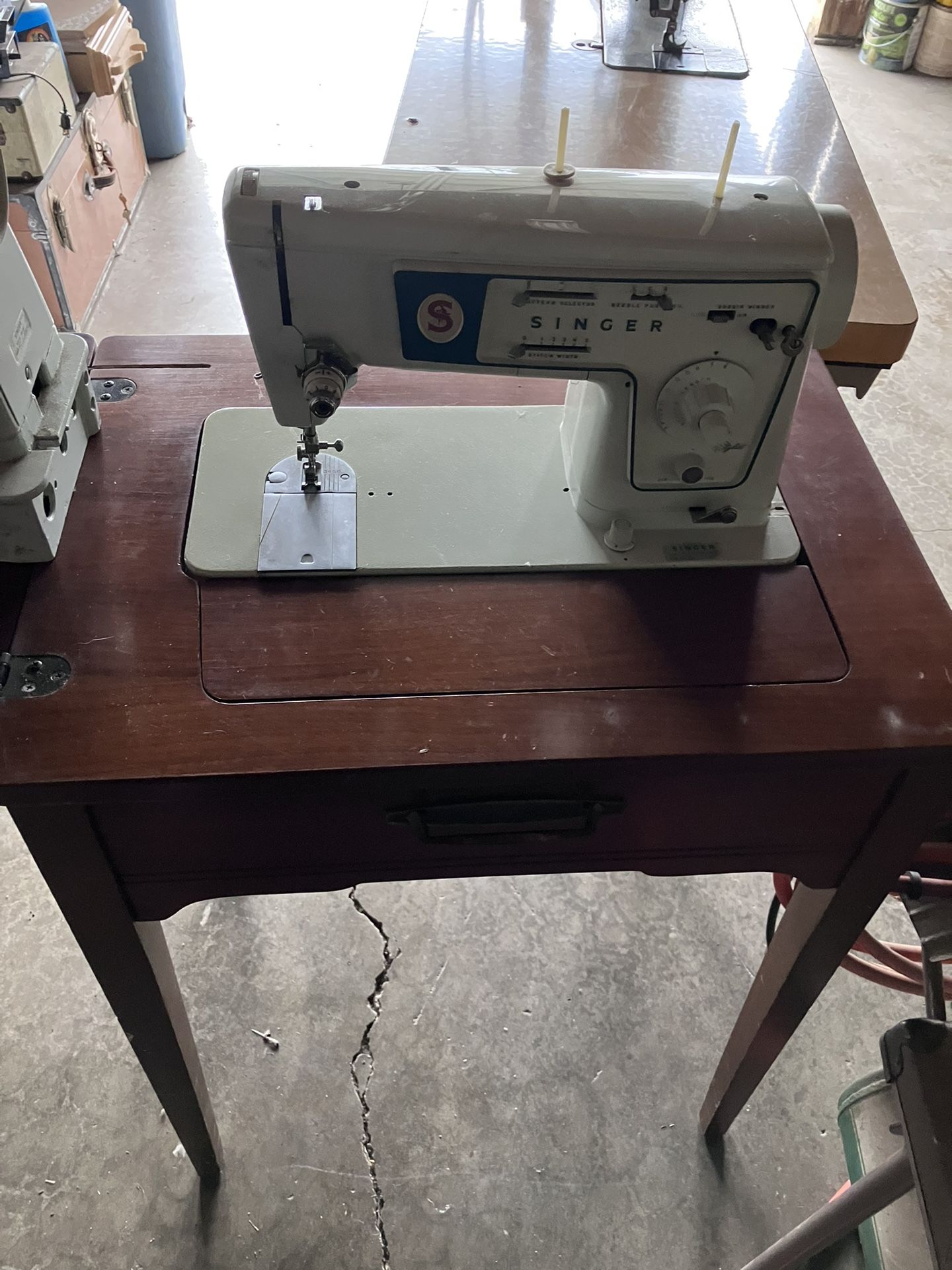 Singer Sewing Machine In Cabinet