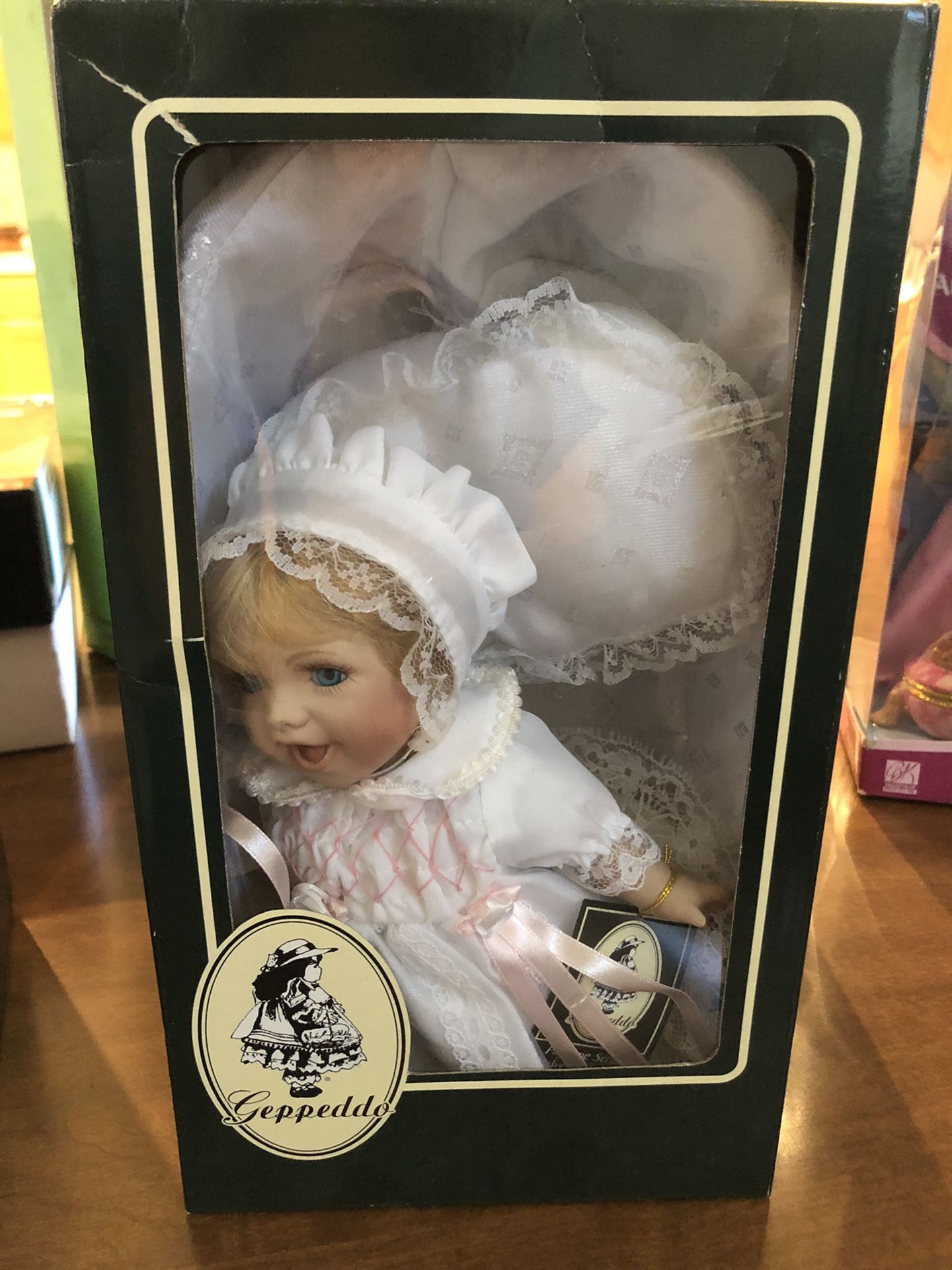 Geppeddo Collector Series Porcelain Doll With Crib 