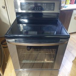 Reduced-Black Stainless And Black Samsung 5 Burner W/ Easy Clean Convection Oven