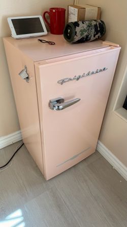 Pink mini fridge