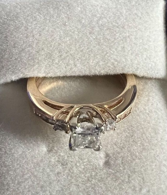  1 Ct. Princess Cut Diamond Set 14Kt gold with ring enhancer 1/4Ctw gold
