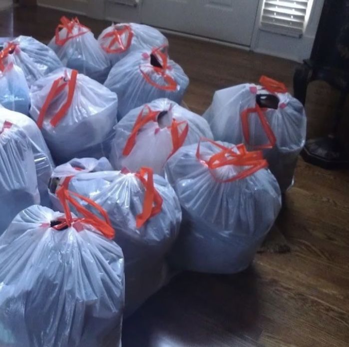 8 Bags Of Clothes $100 sweaters Not Free !!