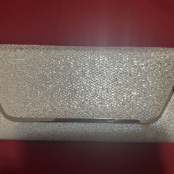 Also silver glitter clutch  Like new used one time