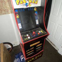 PAC MAN WITH 7 DIFFERENT GAMES