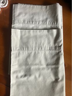 Lot of 2 sandstone colored pillow cases